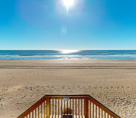 View of the beach from property